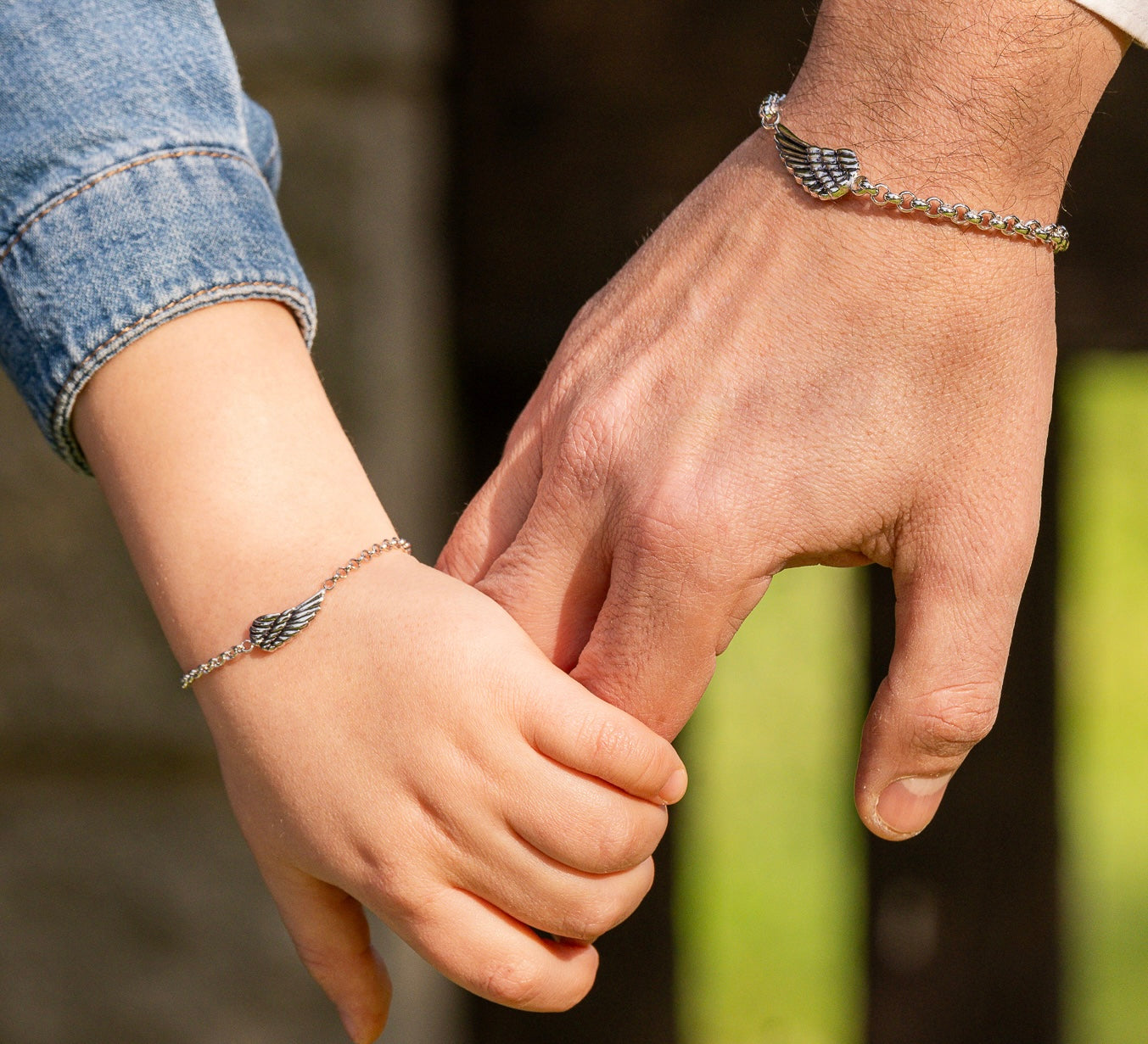 CHILD BRACELET WITH SILVER CHAIN ​​AND WING CHARM