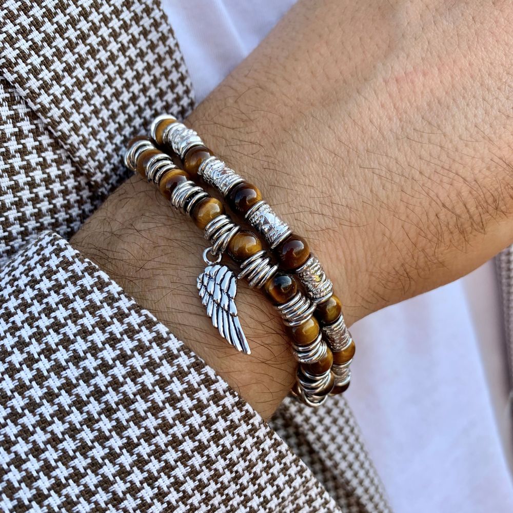 Nike men s bracelet with Silver headbands and Tiger s Eye Wing charm